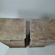 Pair of antique bedside tables with a green patina