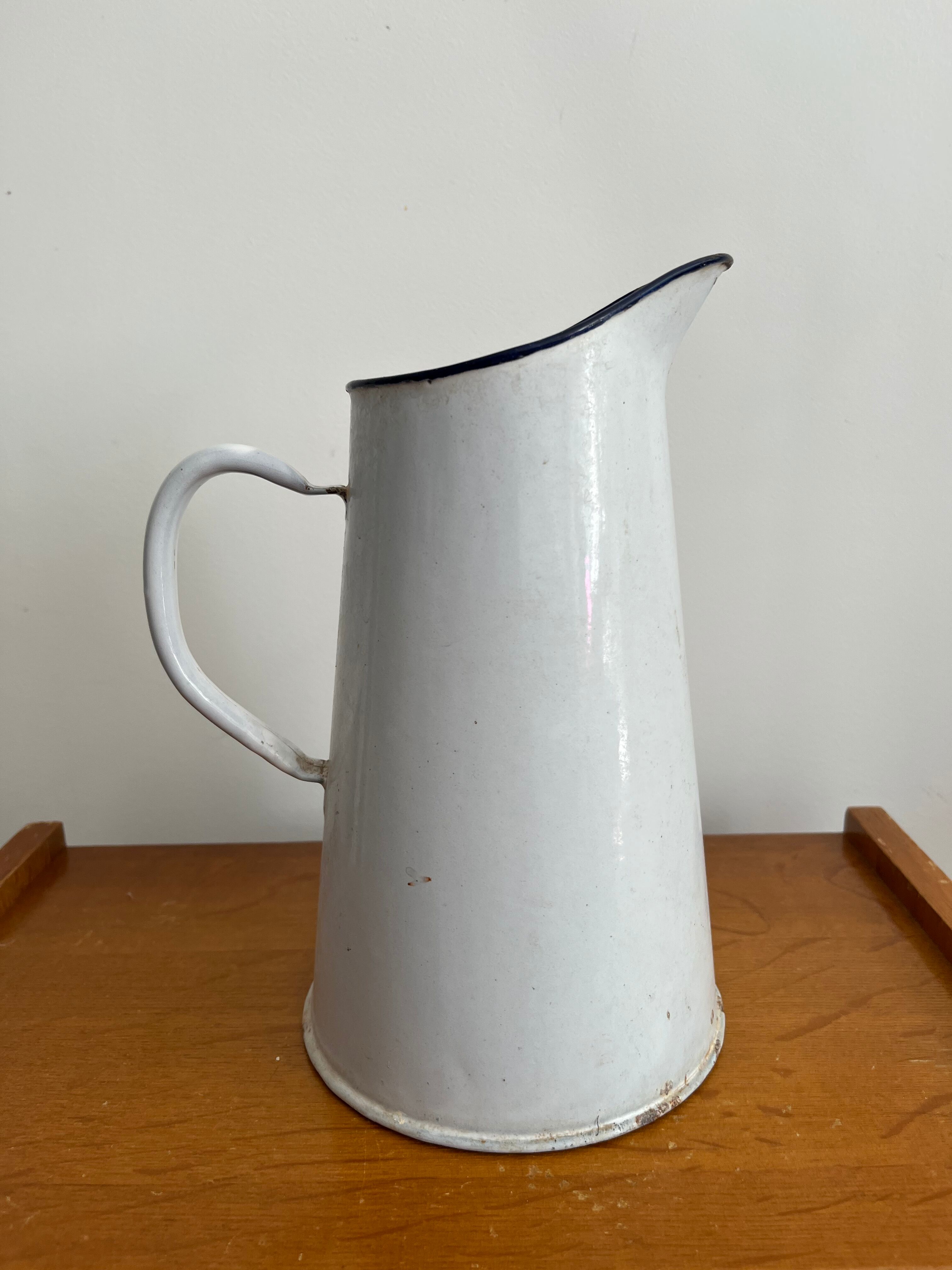 Antique enamelled broc vase