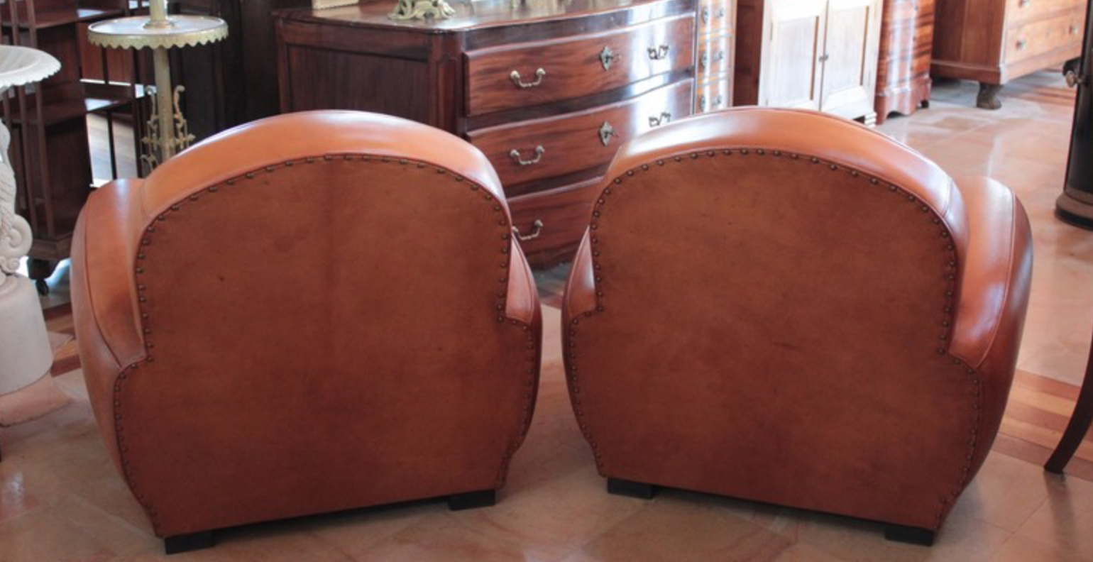 Pair of club chairs in leather