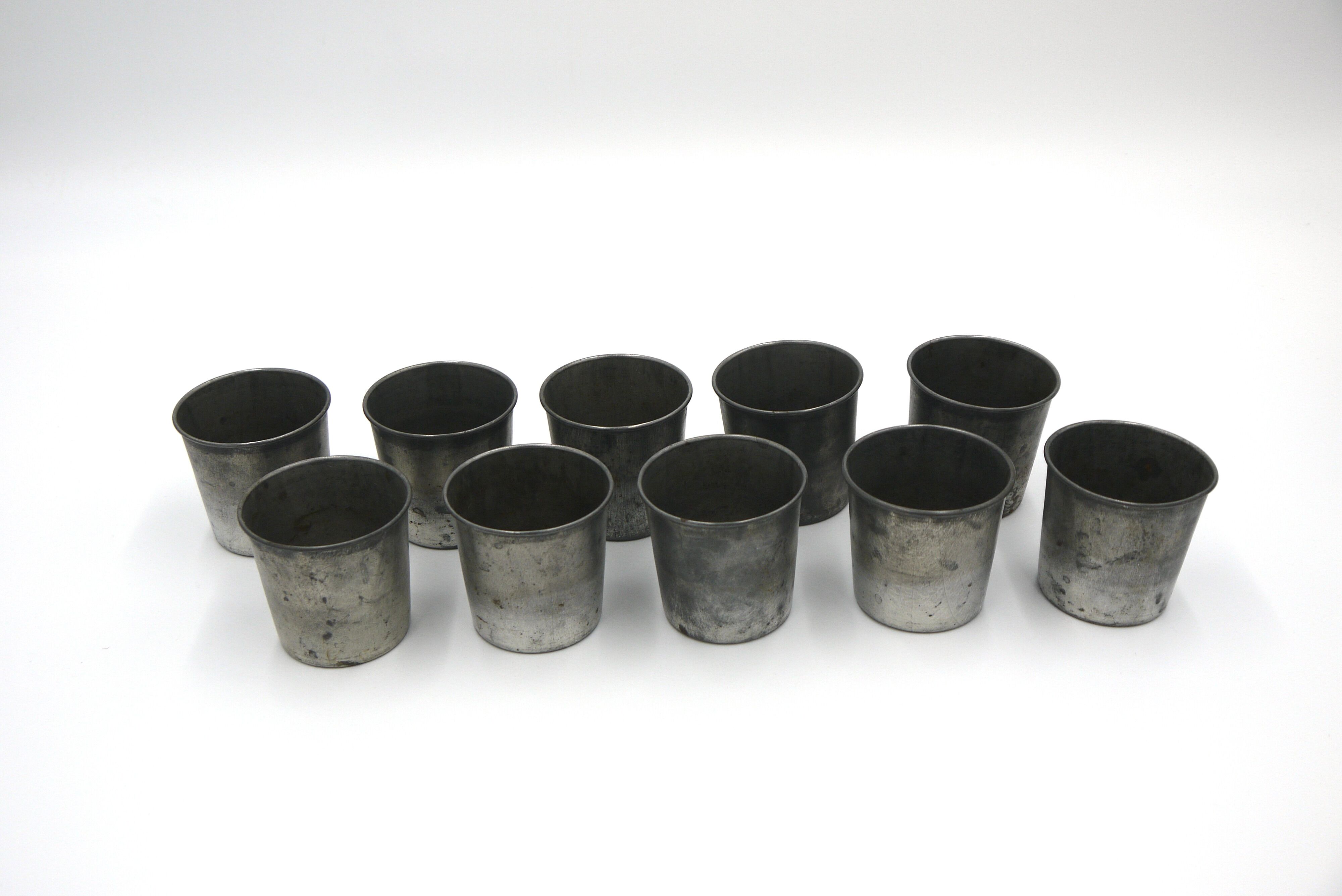 Set of 10 tin cups