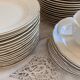 Service of 53 pieces of plates and dishes by Villeroy & Boch in cream and gold, model Saar.