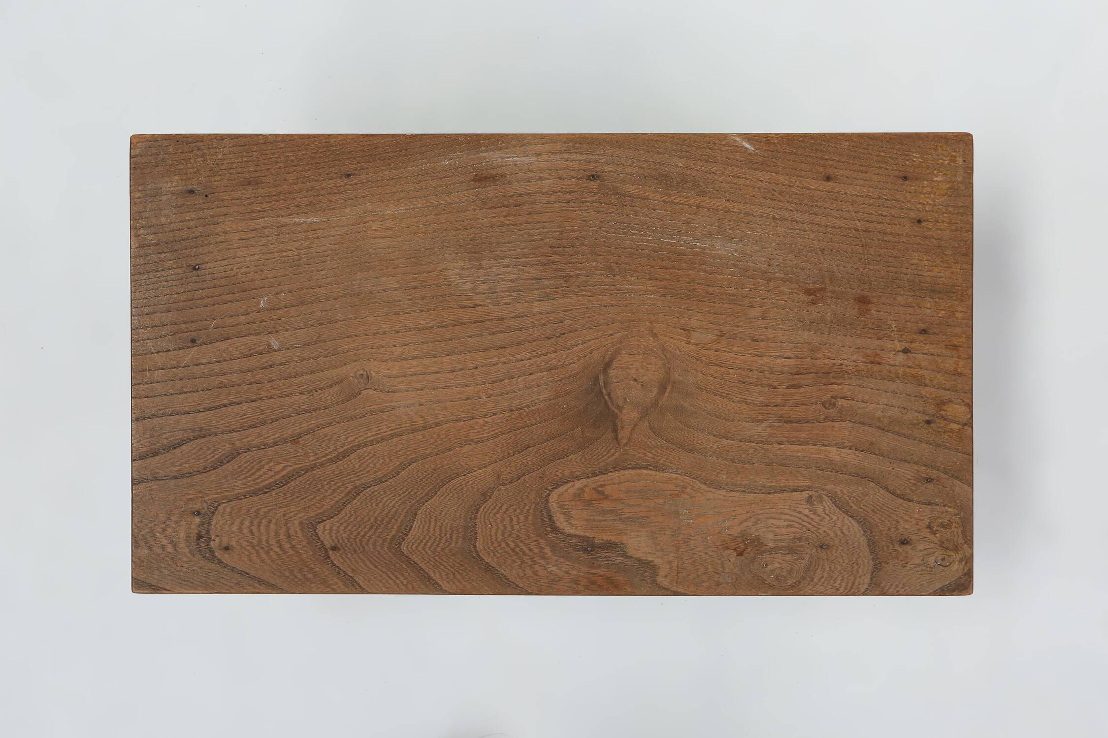 Small rustic wooden stool with curved base, France ca. 1900