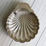 large silver-plated metal shell-shaped dish