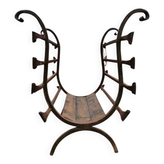 Vintage black wrought iron fireplace log holder / 1960s
