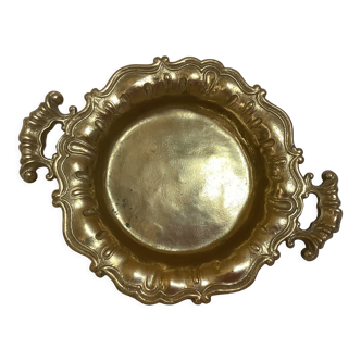 Empty baroque brass pocket