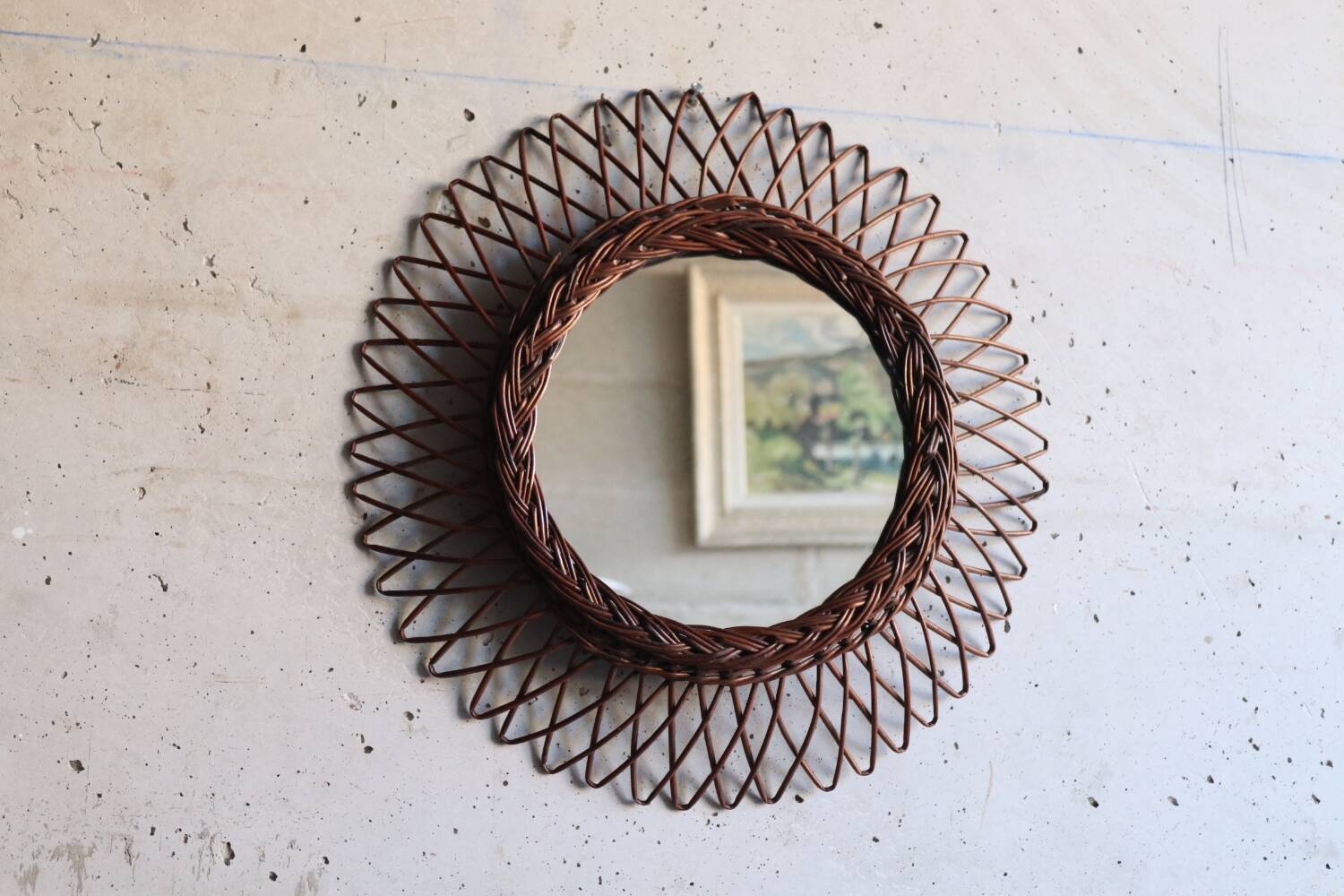 Vintage rattan sun mirror