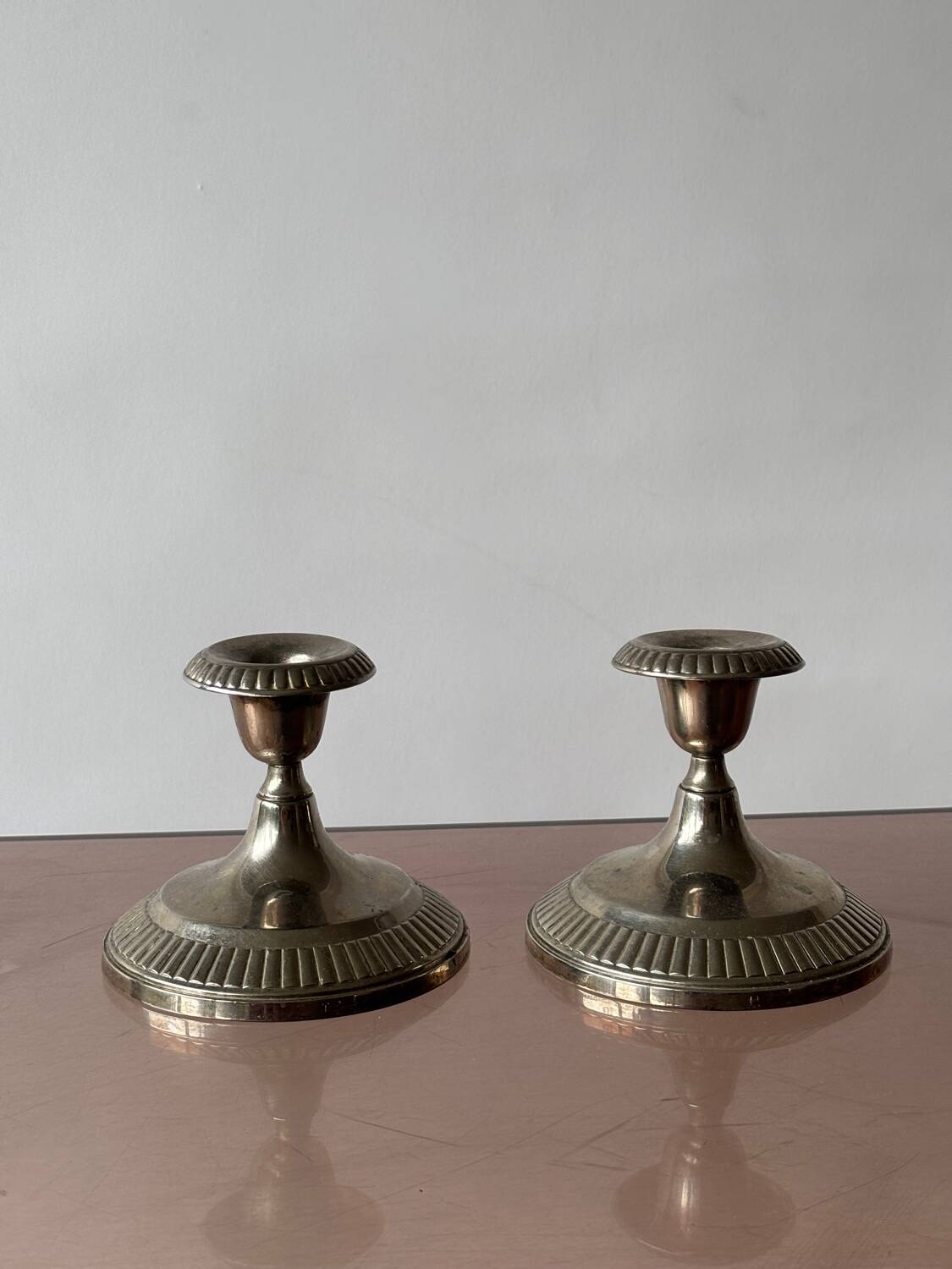 Antique silver-plated metal candlesticks