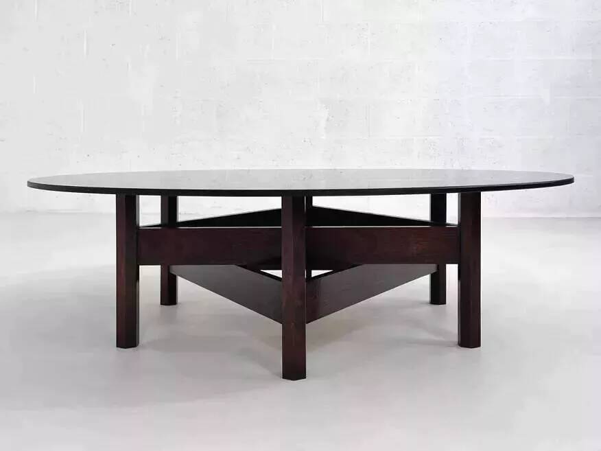 Wooden coffee table with round smoked glass top