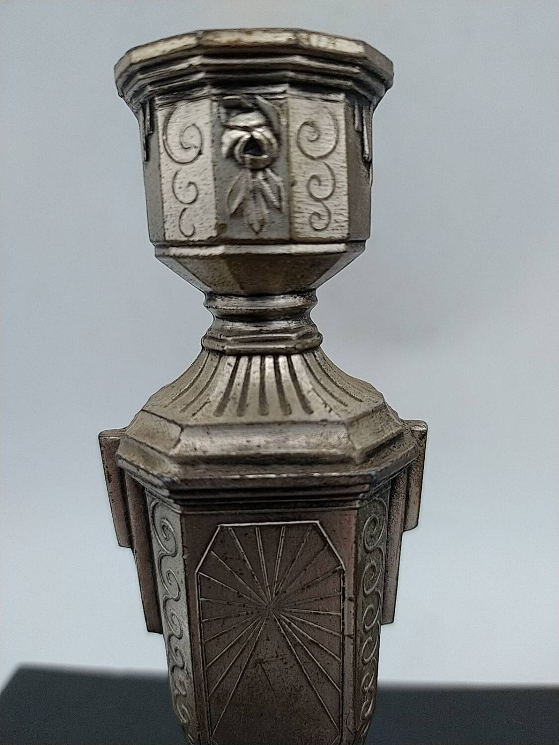 Art Deco metal candle holders.