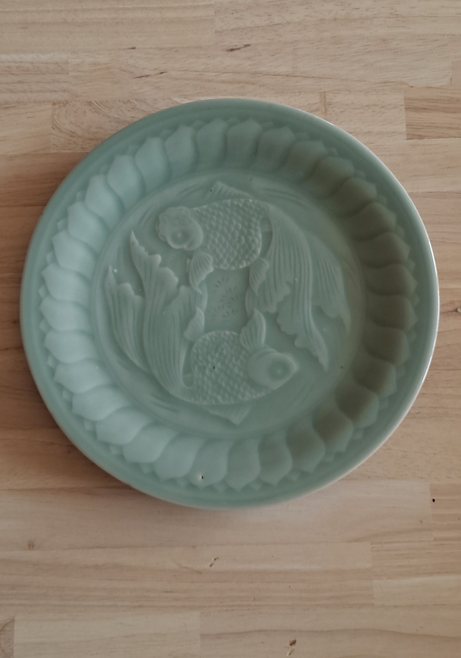 Celadon green plate with fish