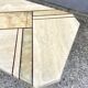 Low table in travertine and onyx 80'