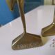 Coupled with brass herons