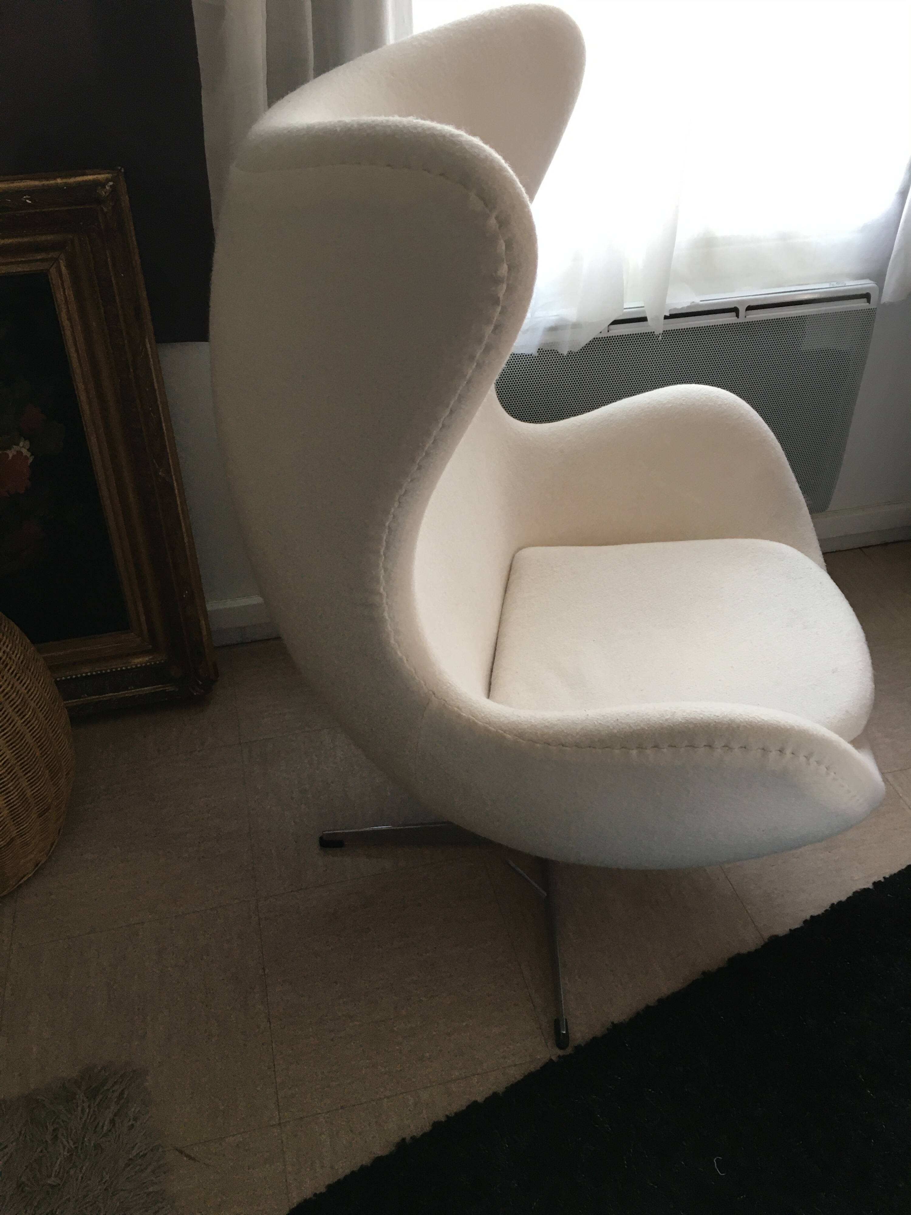 2 white felt egg chairs