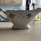 Vintage sauce boat L'Amandinoise 1080 with roses and gilding.