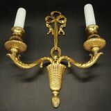 Paire d'appliques au noeud style Louis XVI - bronze