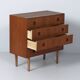 Danish teak chest of drawers, 1960s – 4 drawers, key and recessed handles