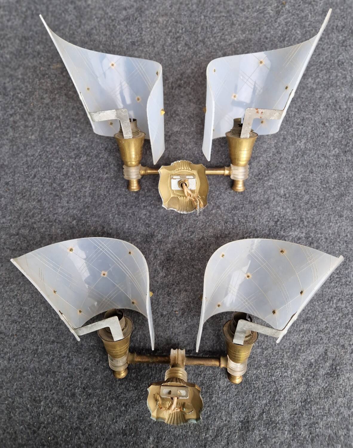Pair of plastic and brass wall lights from the 60s/70s
