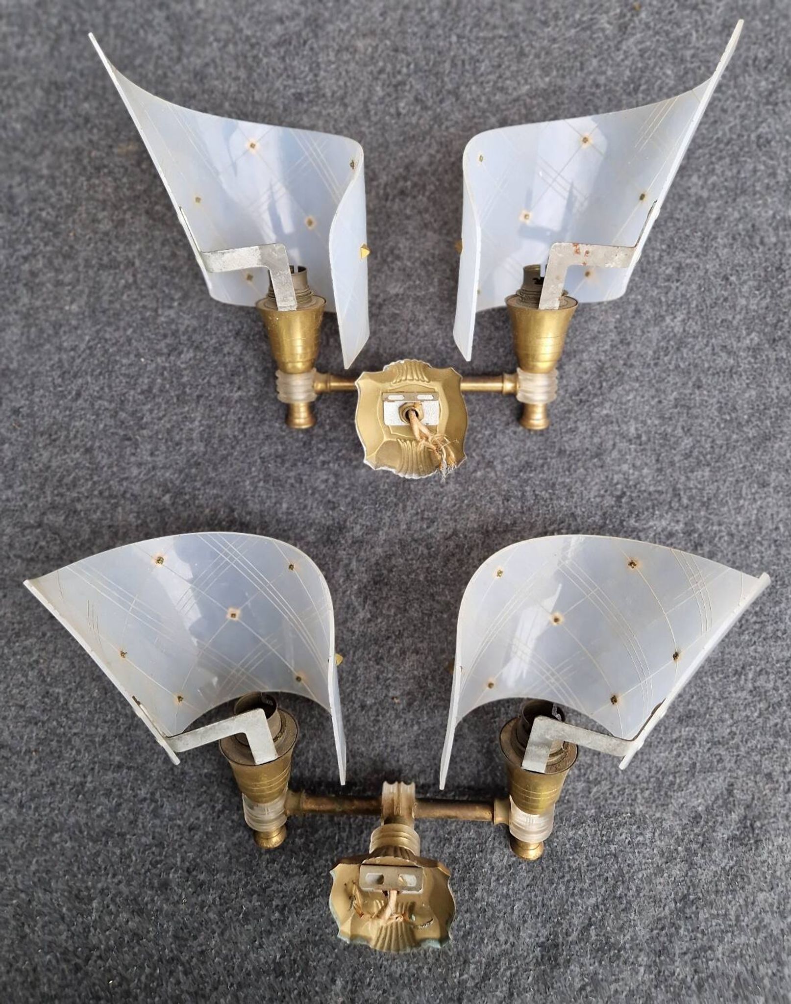Pair of plastic and brass wall lights from the 60s/70s.