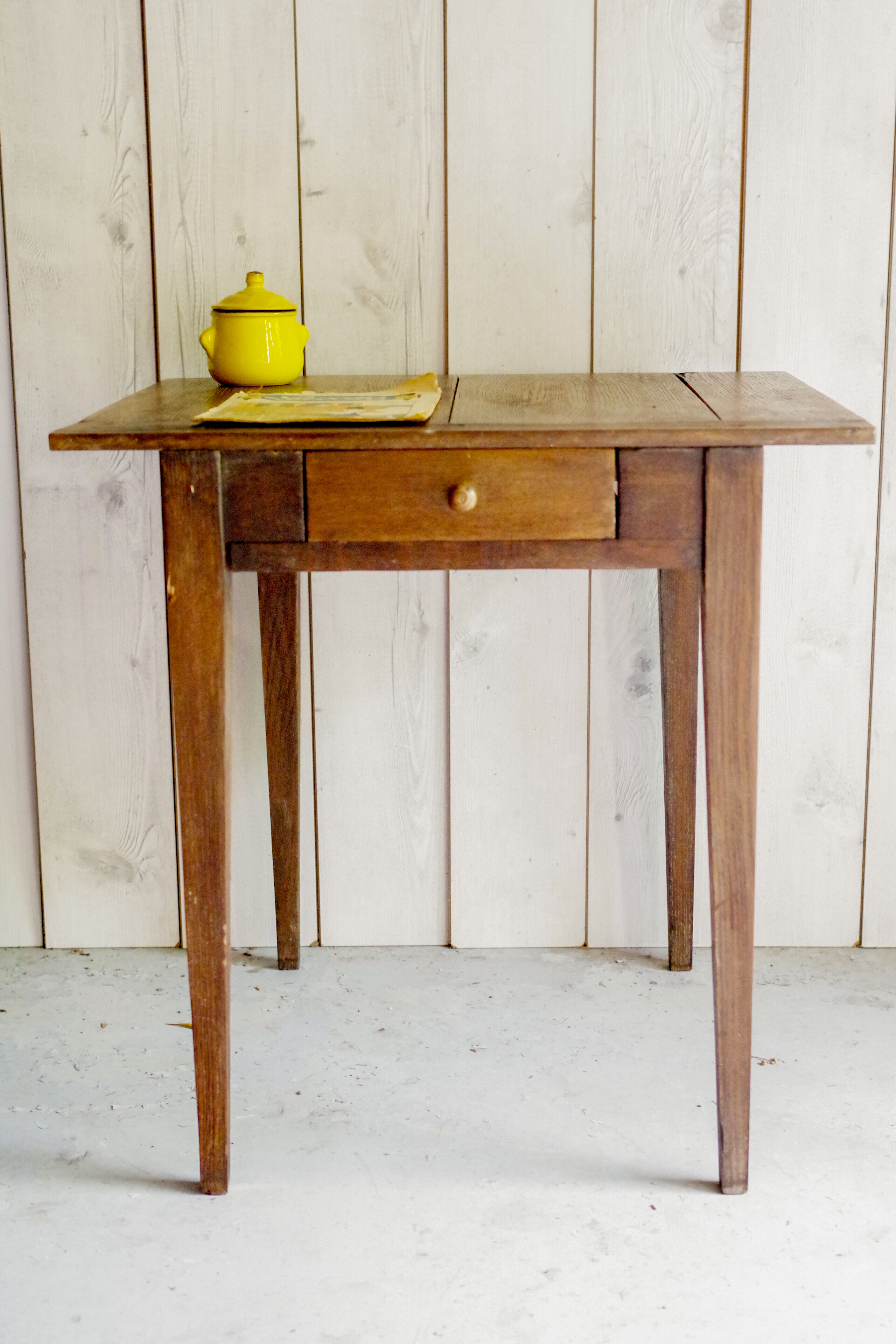 Old rustic wooden farmhouse table in 50s