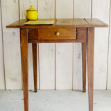 Old rustic wooden farmhouse table in 50s