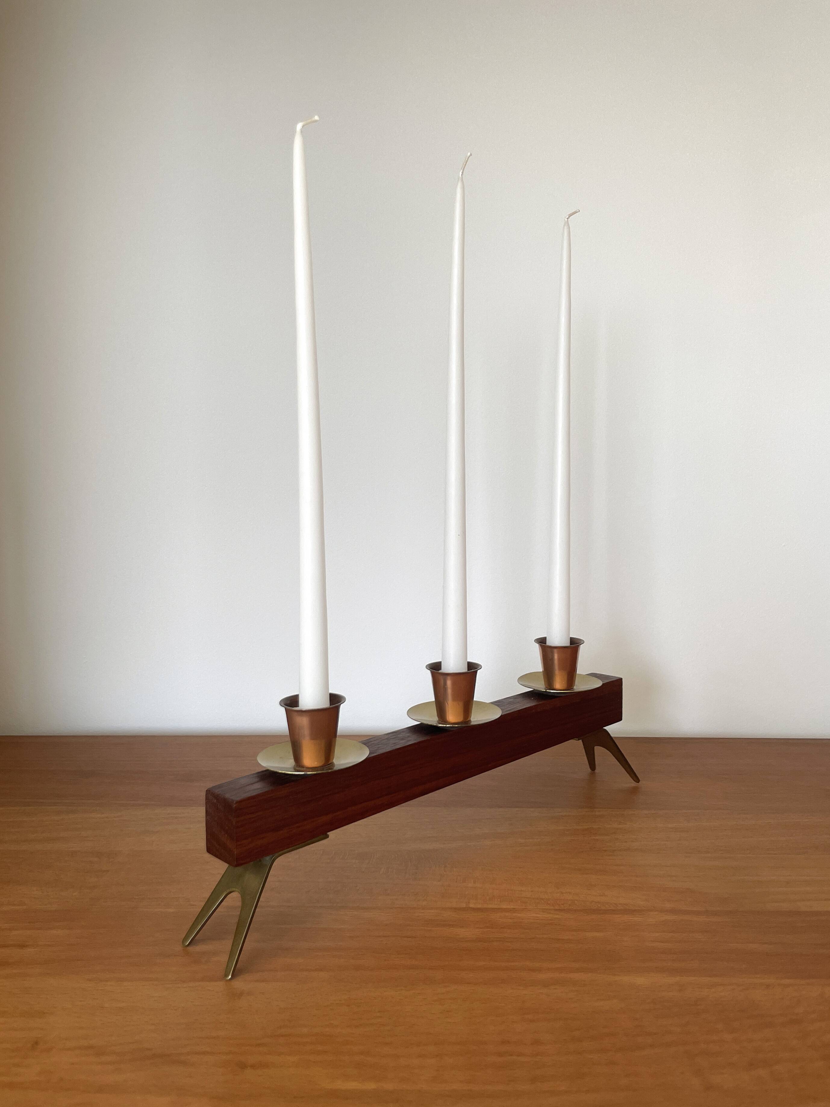 Modernist chandelier in teak and vintage brass.