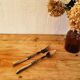 Vintage serving cutlery in horn and wrought metal