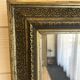 Large gilded antique mirror with moulding in the Napoléon III style.