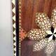 Old oriental plateau in marquetry.