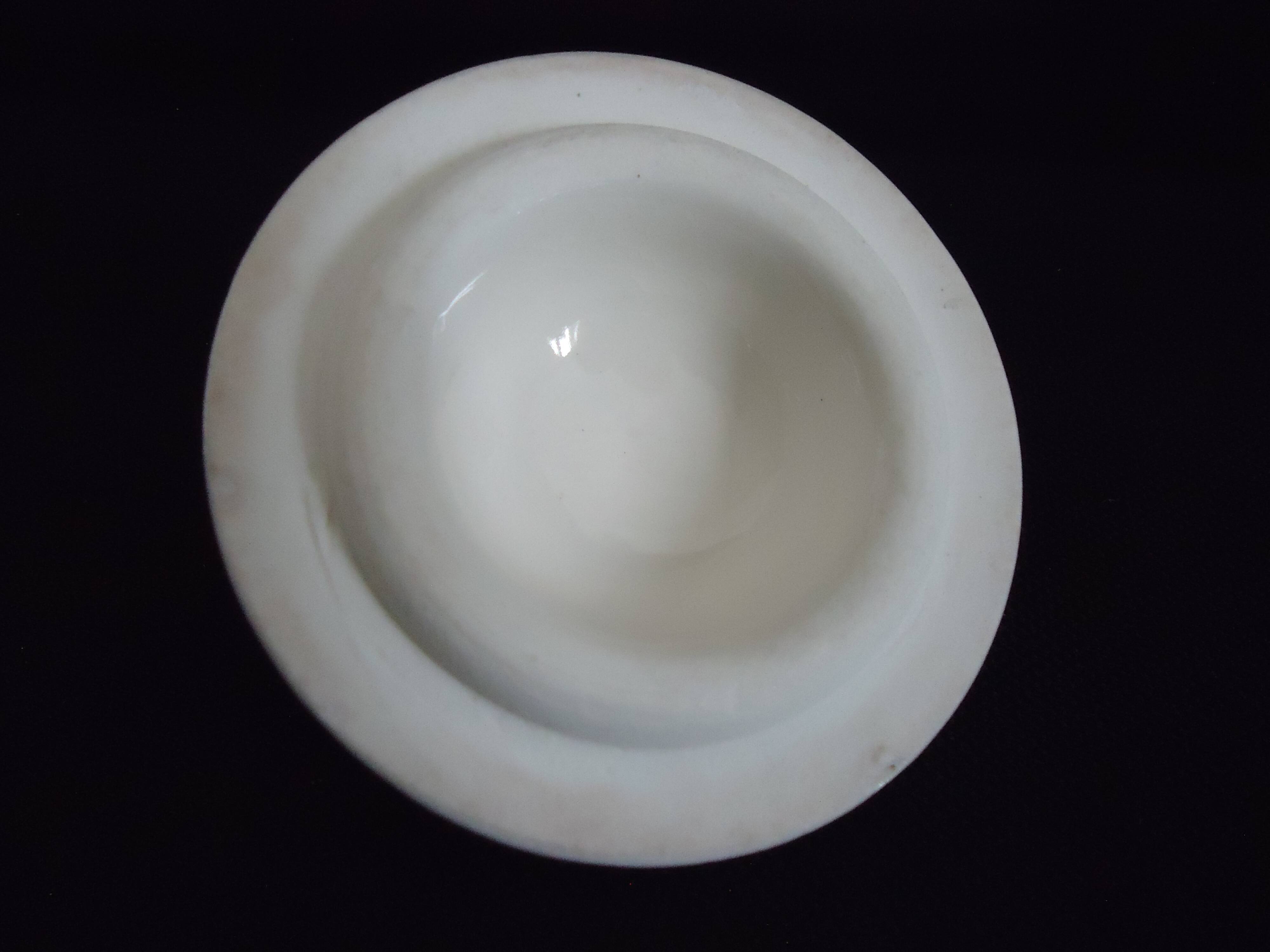 Old covered milk jug, side handle