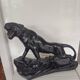 Large animal sculpture representing a roaring panther, signed BE.