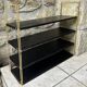 Double gold metal string shelves and black trays, vintage, 60s
