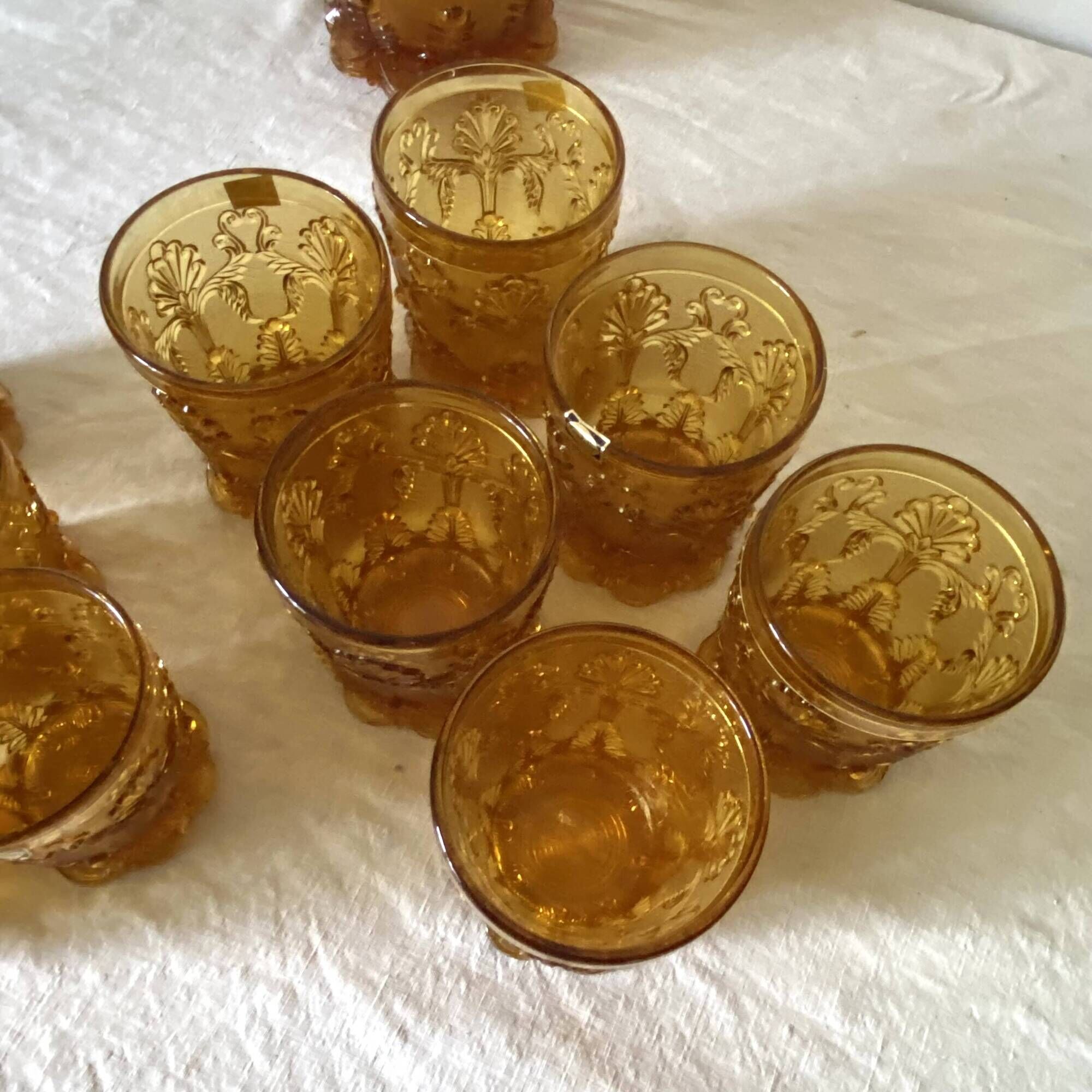Glasses and ice bucket baroque style amber glass Italy 70s