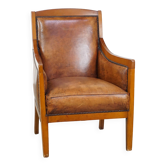Sheep leather Art Deco design armchair combined with wood