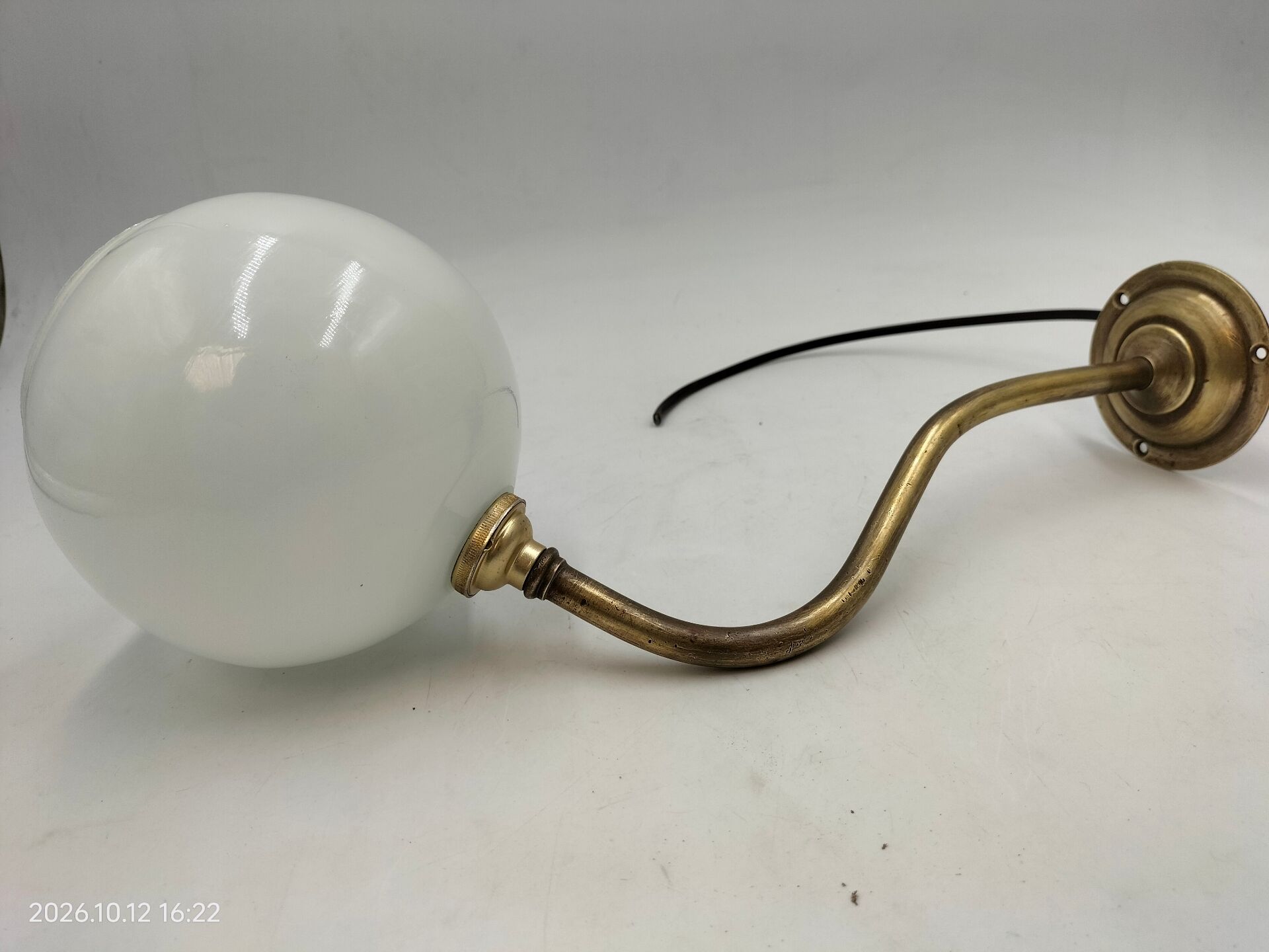 Brass and glass wall light
