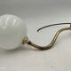 Brass and glass wall light