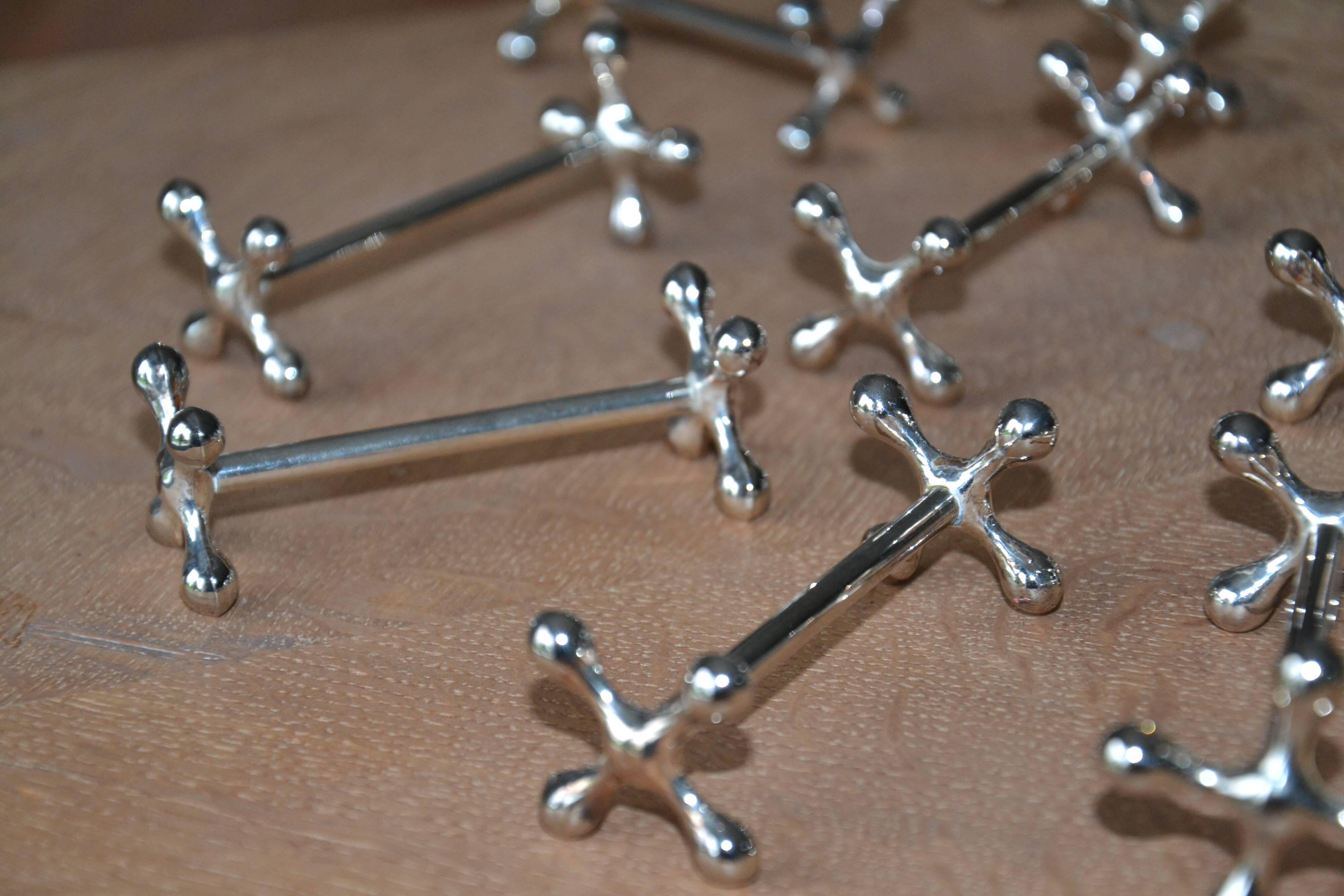 12 silver metal knife holders