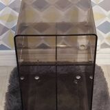 Michel Dumas smoked Plexiglas rolling table.