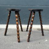 Pair of wooden tripod stools