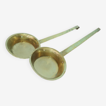 Ladles with old brass jams