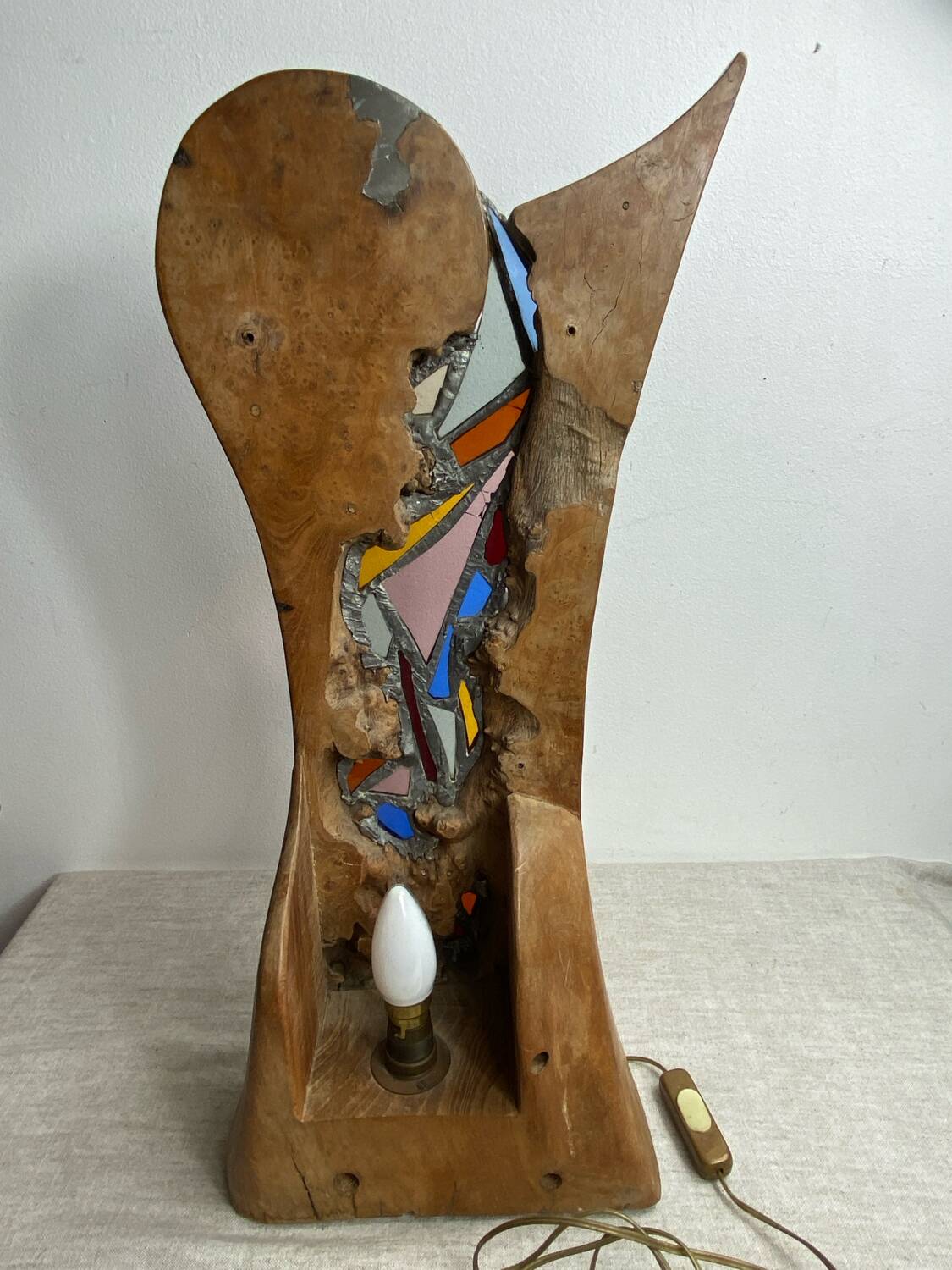 Carved wooden lamp and stained glass