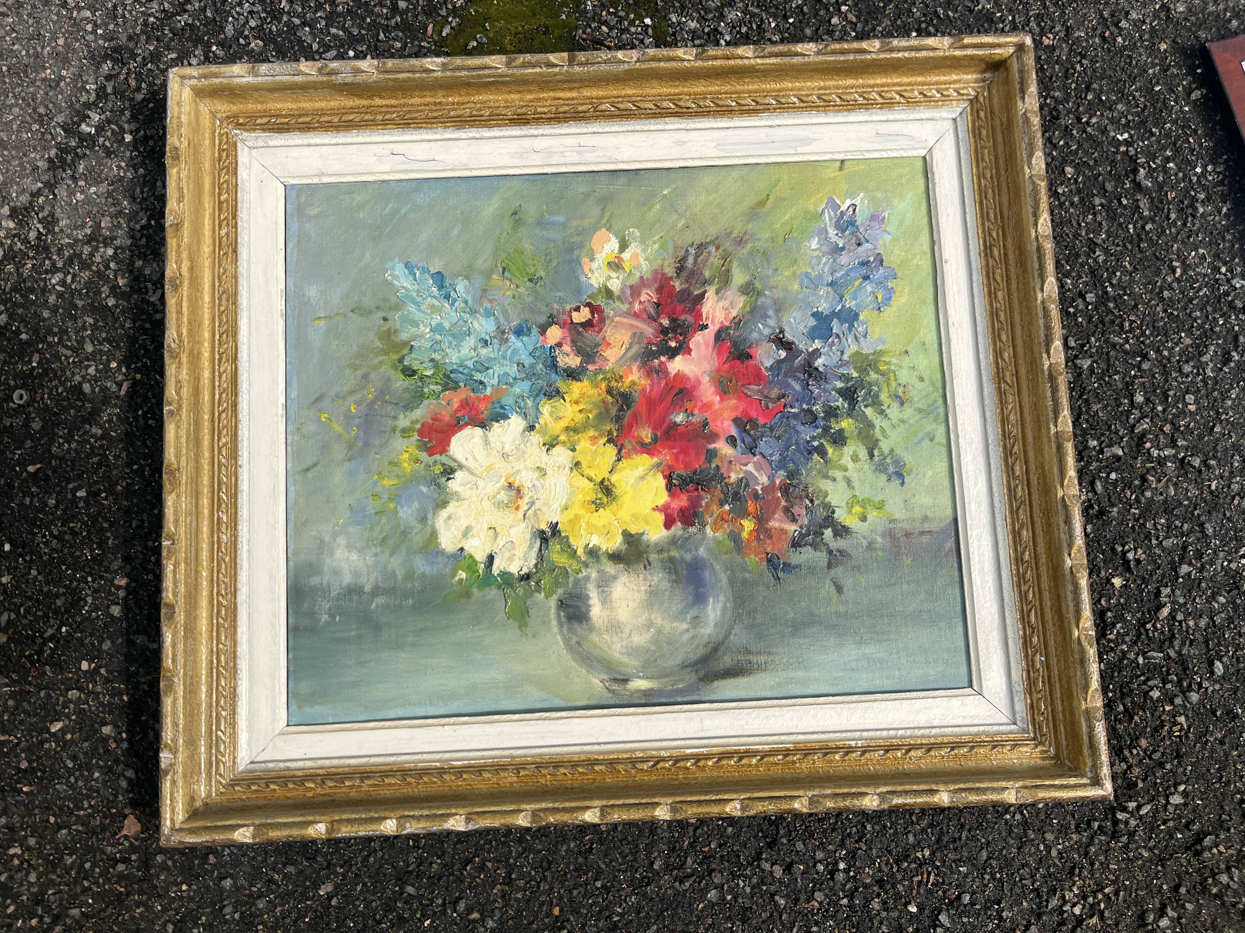 Still life of flowers in Impressionist style with a golden frame.