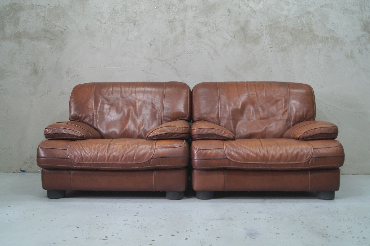 A pair of vintage Italian leather Lounge Chairs, 1970s
