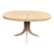 Renovated oval Scandinavian extendable dining table in wood with a central leg.