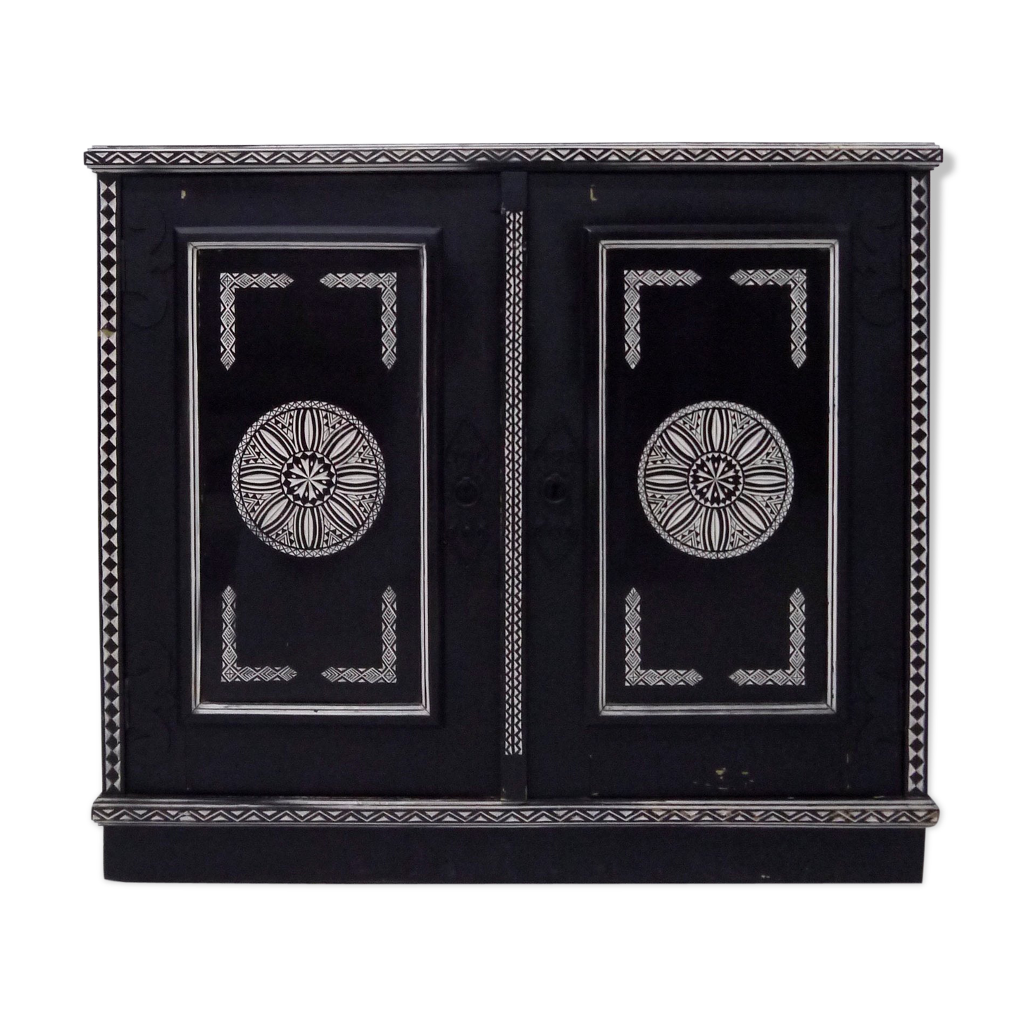 Antique wooden cabinet painted in black and with incised white painted decorations, Ettore Zaccari, Italy c 1910