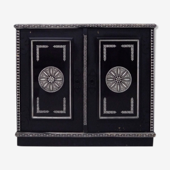 Antique wooden cabinet painted in black and with incised white painted decorations, Ettore Zaccari, Italy c 1910