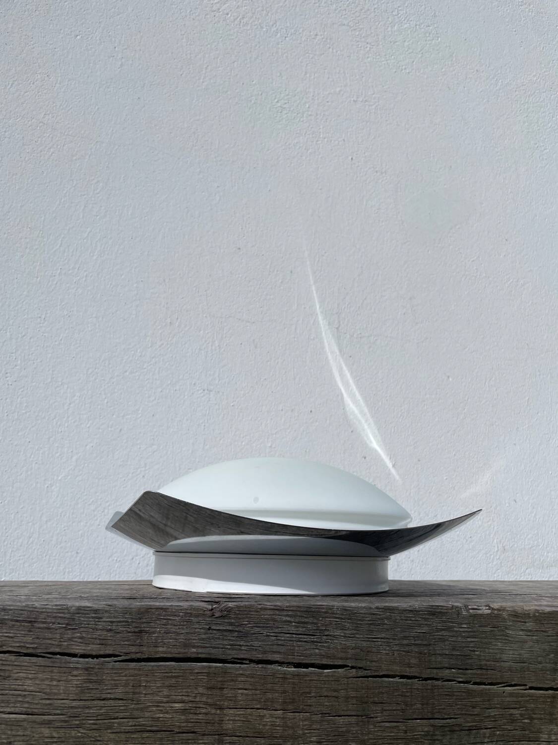 White glass and stainless steel ceiling light