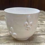 Pitcher and its glass in white earthenware from Malicorne