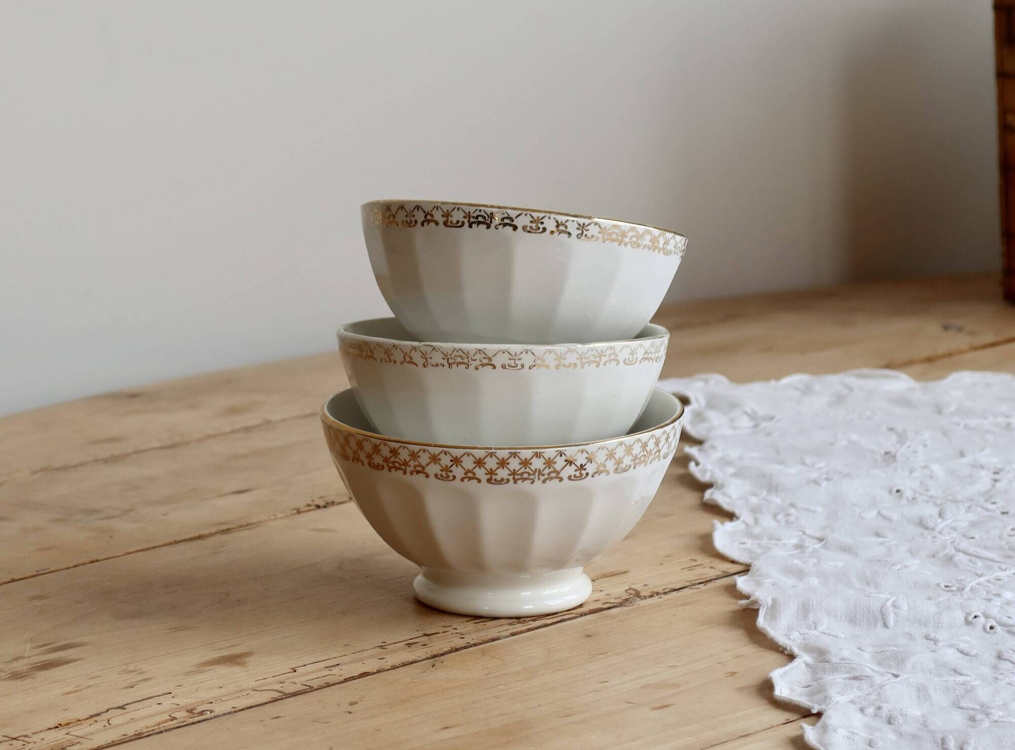 Vintage trio of coffee with milk porcelain in white – Frieze and border do