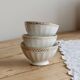 Vintage trio of coffee with milk porcelain in white – Frieze and border do