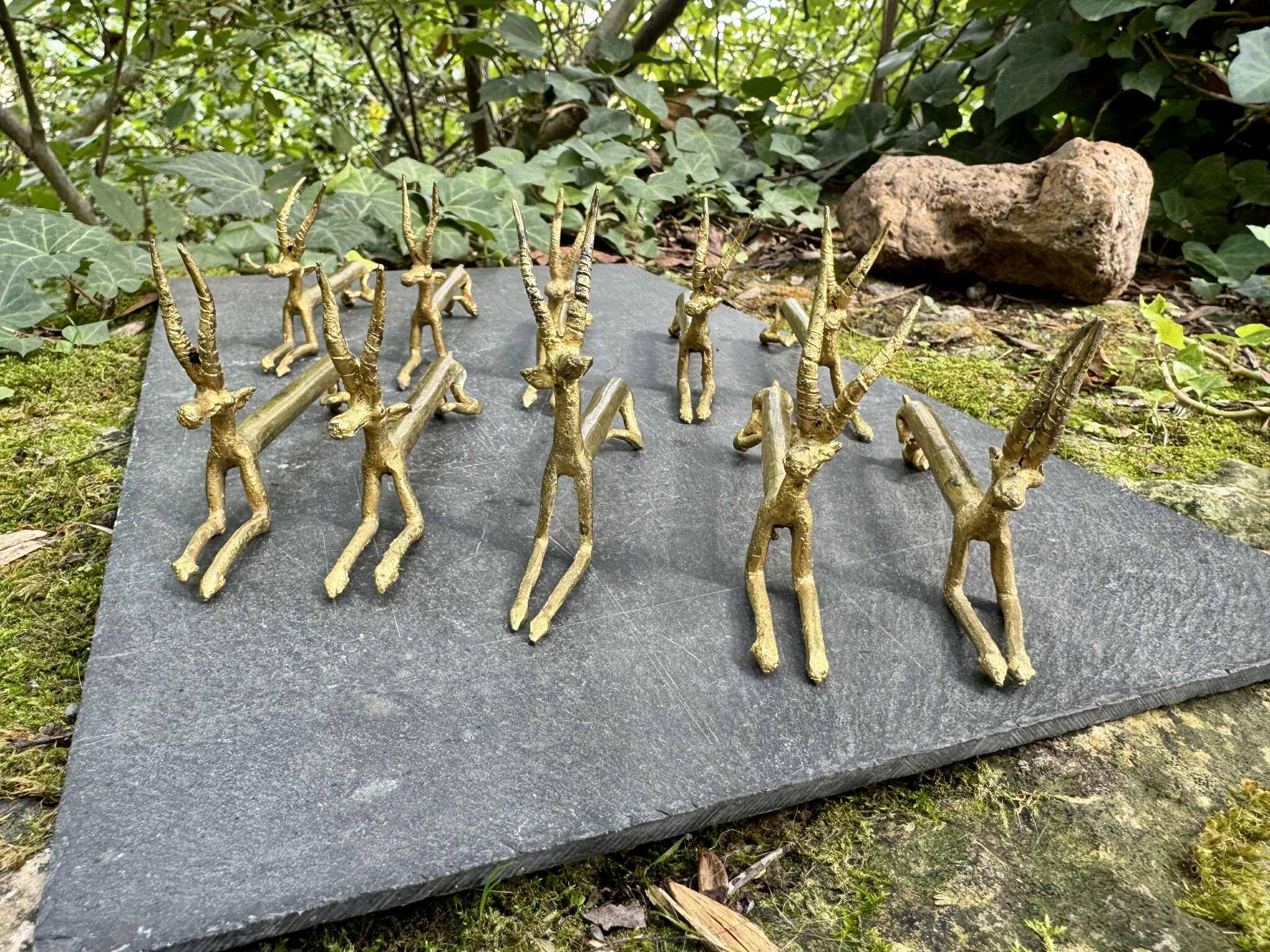 10 brass antelope knife holders